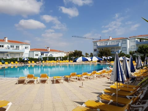 Property building, Living room, Swimming pool