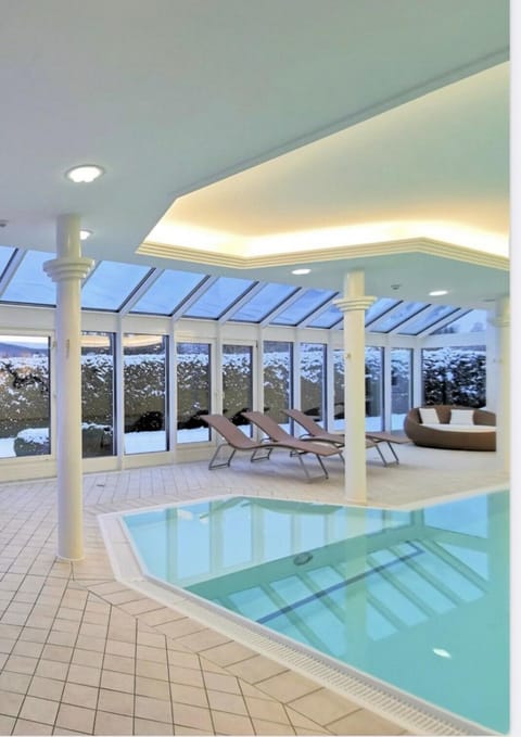 Property building, Living room, Swimming pool