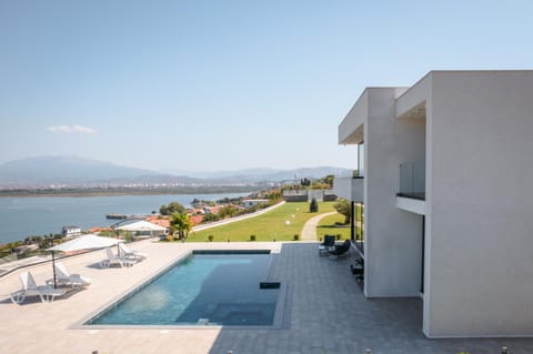 Property building, Patio, Natural landscape, View (from property/room), Balcony/Terrace, Lake view, Mountain view, Pool view, Swimming pool, Swimming pool, sunbed