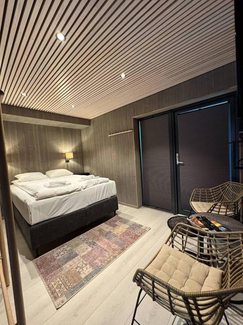 Bed, Seating area, Bedroom