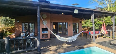 Patio, View (from property/room), Seating area, Pool view, Swimming pool