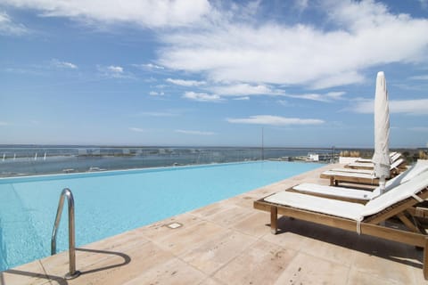 Property building, Living room, Swimming pool