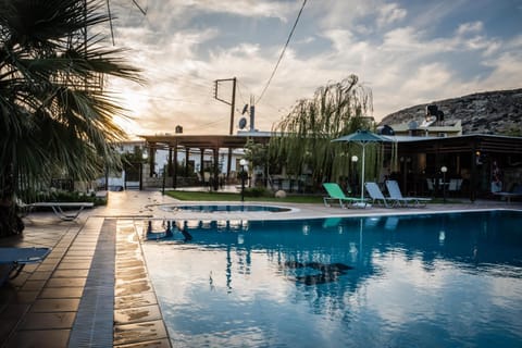 Property building, Swimming pool, Sunset
