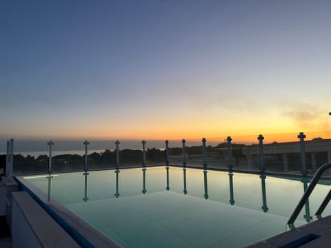 View (from property/room), City view, Pool view, Sea view, Swimming pool, Sunset
