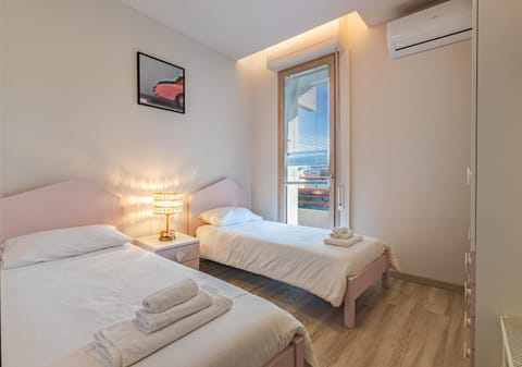 Bed, Photo of the whole room, Bedroom, towels, air conditioner