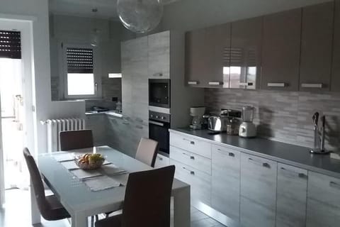 Kitchen or kitchenette, Dining area, dishwasher, stove, toaster