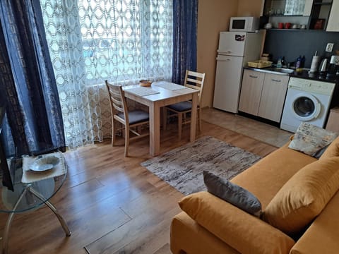 Living room, Seating area, oven, stove, washing machine