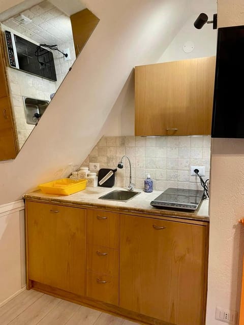 Kitchen or kitchenette, stove