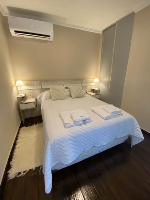 Bed, Photo of the whole room, Bedroom, towels, air conditioner