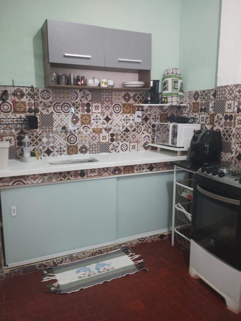 Casa para temporada, 687 casa 03 FUNDOS Apartment in Cabo Frio