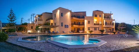 Property building, Night, Pool view, Swimming pool, sunbed