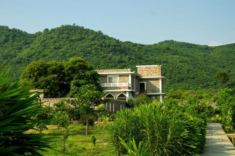 Property building, Spring, Day, Natural landscape, Garden, Garden view, Mountain view