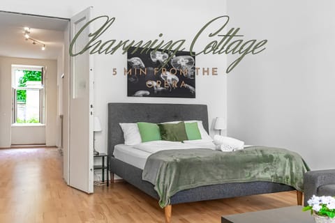 Bed, Photo of the whole room, Bedroom, Text overlay, towels
