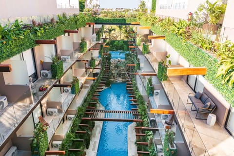 Property building, Day, Pool view, Swimming pool, sunbed