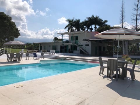 Property building, Patio, Restaurant/places to eat, Day, Natural landscape, Pool view, Breakfast, sunbed