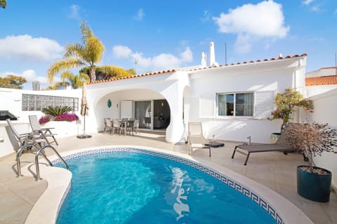 Property building, Living room, Swimming pool