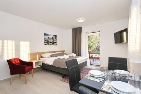 Bed, Living room, Dining area