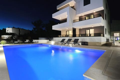 Property building, Night, Swimming pool
