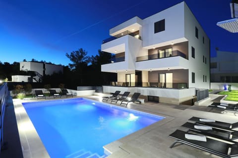 Property building, Night, Swimming pool