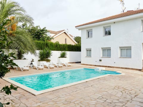 Property building, Living room, Swimming pool