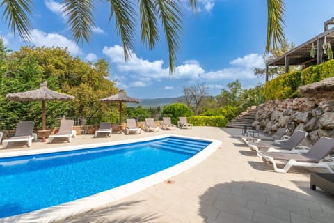 Property building, Living room, Swimming pool