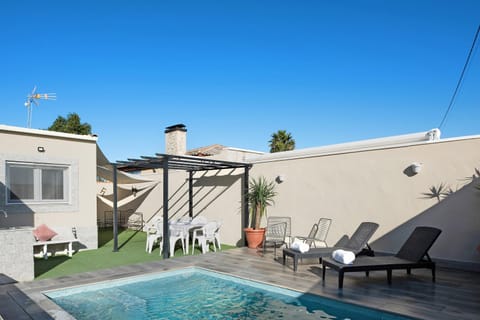 Property building, Living room, Swimming pool