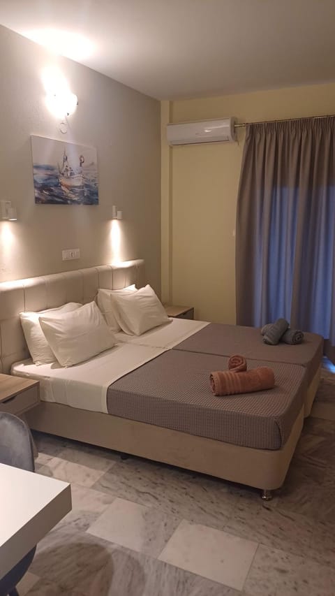 Bed, Photo of the whole room, Bedroom, towels, air conditioner