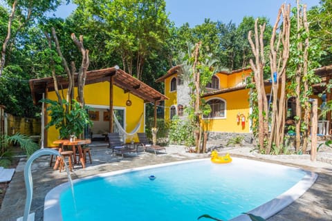 Property building, Patio, Spring, Natural landscape, Garden, Garden view, Pool view, Swimming pool, sunbed