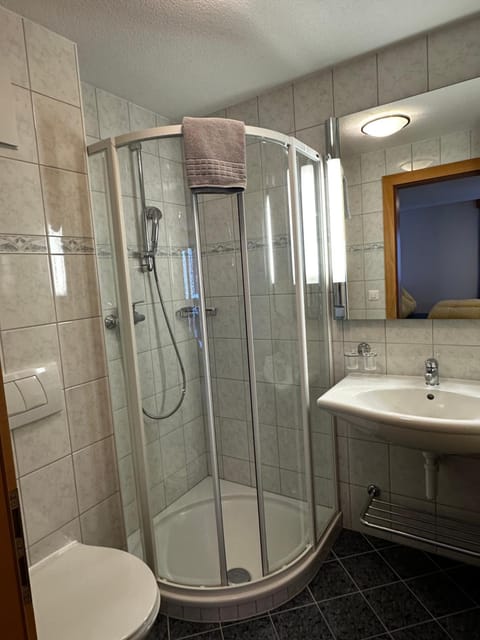 Shower, Bathroom, hair dryier, towels