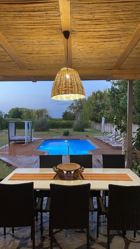 Patio, Day, Dining area, Pool view, Swimming pool, sunbed