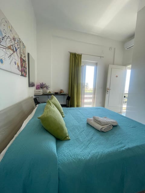 Bed, Photo of the whole room, Bedroom, towels, air conditioner