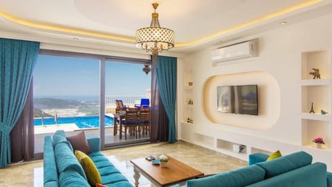 Natural landscape, Living room, Seating area, Swimming pool, sunbed, air conditioner