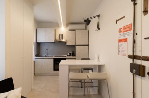 Facade/entrance, Kitchen or kitchenette, Dining area, oven, stove, wardrobe