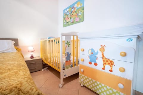 Bed, Photo of the whole room, Bedroom, cot, fireplace, towels, wardrobe