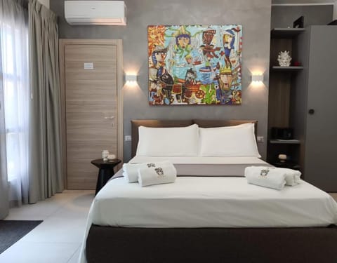 Bed, Photo of the whole room, Bedroom, towels, air conditioner
