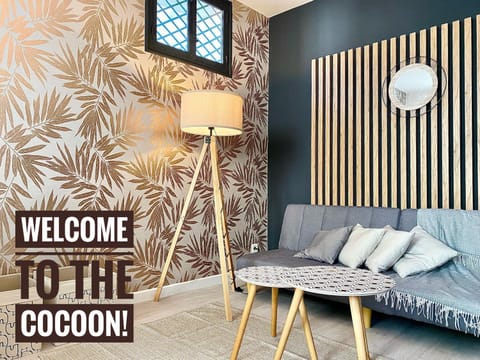 Bed, Living room, Seating area, Text overlay