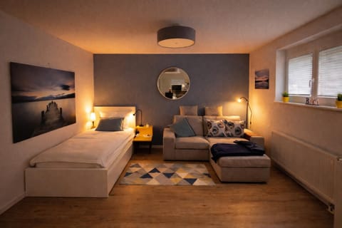 Bed, TV and multimedia, Living room, Photo of the whole room, Seating area, Bedroom