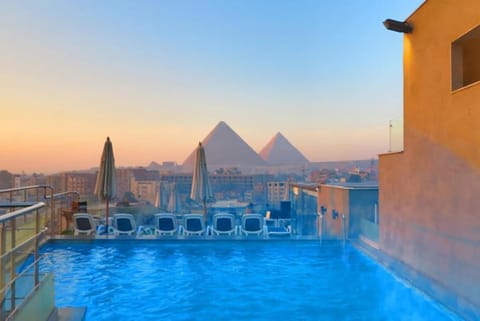 View (from property/room), Swimming pool, Sunrise