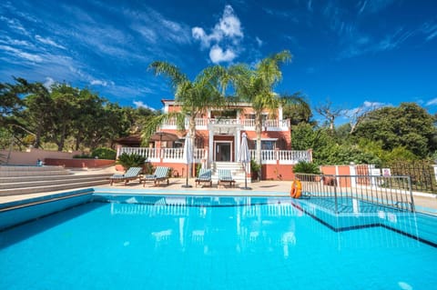 Property building, Day, Pool view, Swimming pool, sunbed