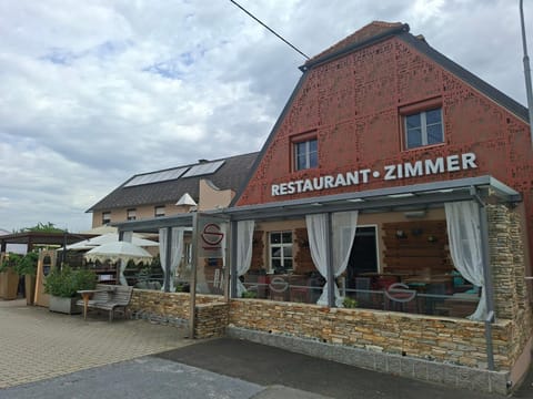 Property building, Restaurant/places to eat, Property logo or sign, Seating area, Logo/Certificate/Sign