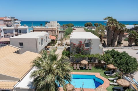 Property building, Day, Natural landscape, Bird's eye view, Beach, Pool view, Sea view, Swimming pool, sunbed