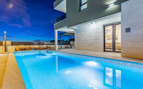 Property building, Night, Swimming pool