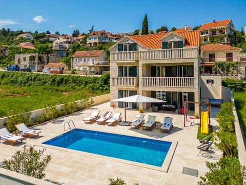 Property building, Patio, Natural landscape, Garden, Garden view, Pool view, Swimming pool, sunbed