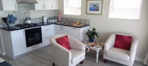 Living room, Seating area, minibar, pet friendly, stove, kitchen