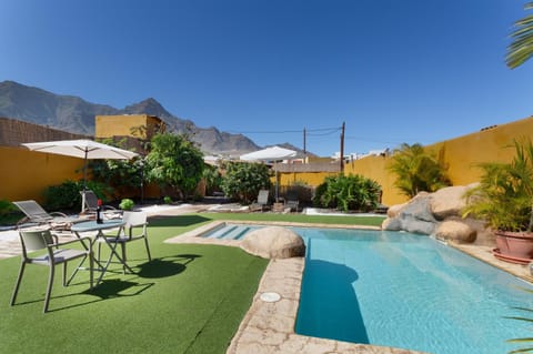 Property building, Living room, Swimming pool