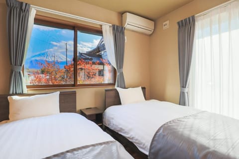 Bed, Natural landscape, Bedroom, Mountain view, air conditioner