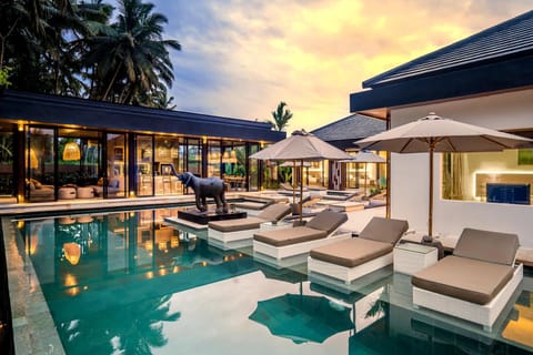 Property building, Seating area, Swimming pool, sunbed