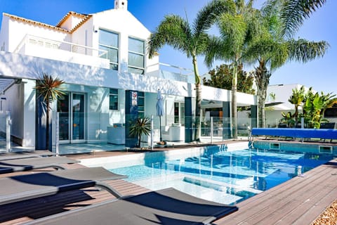 Property building, Pool view, Swimming pool, sunbed