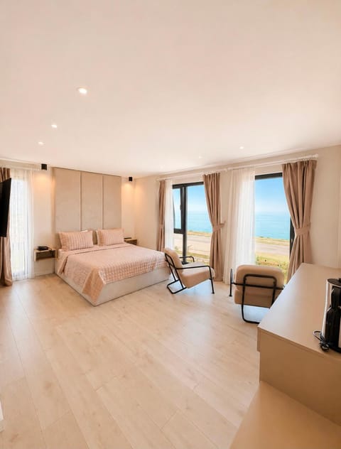 Bed, Natural landscape, Living room, Photo of the whole room, Seating area, Bedroom, Sea view