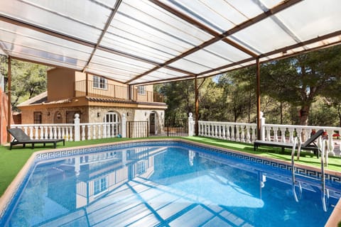 Property building, Living room, Swimming pool